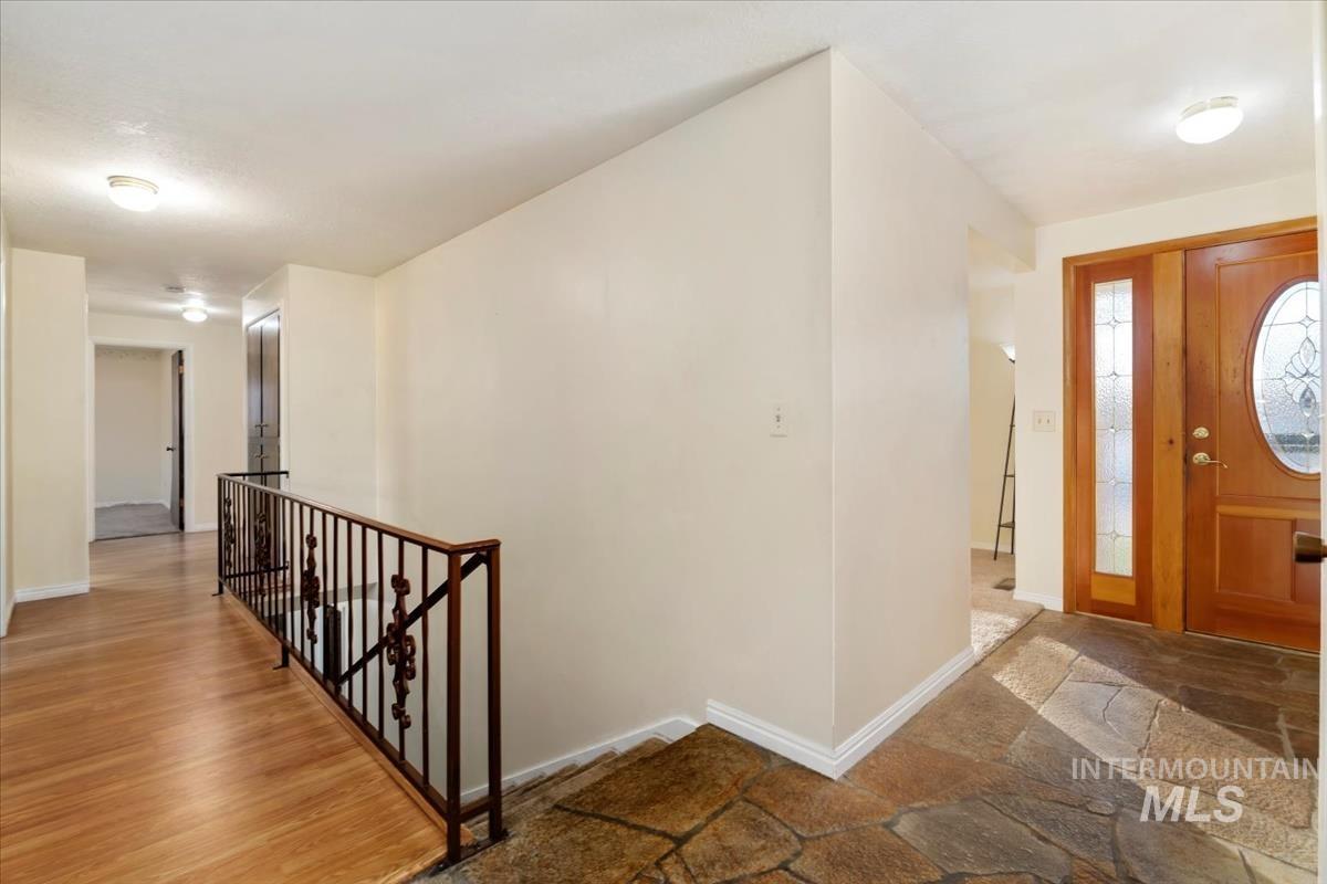 3850 Rugby Drive Boise, ID 83704 - Photo 30 of 44 Entrance foyer with stone tile flooring and baseboards