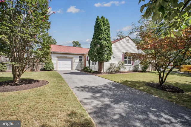 a house with trees in front of it