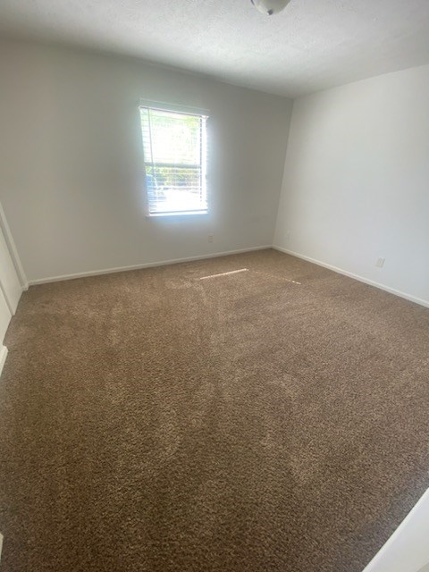 6908 Bullet Boulevard Columbus, GA 31907 - Photo 7 of 8 an empty room with a window
