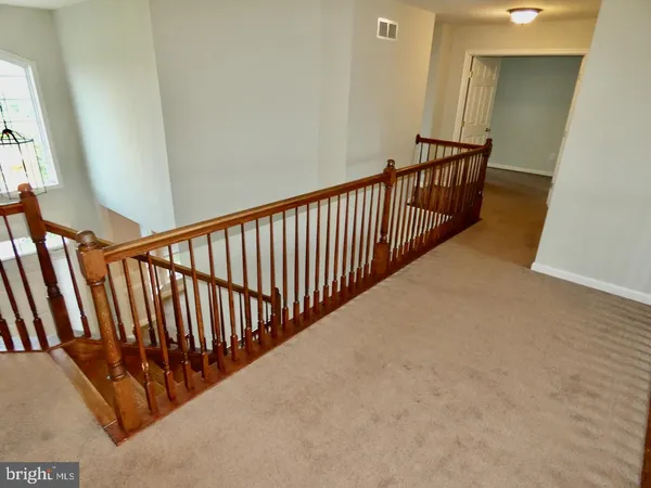 a view of a room with an empty space