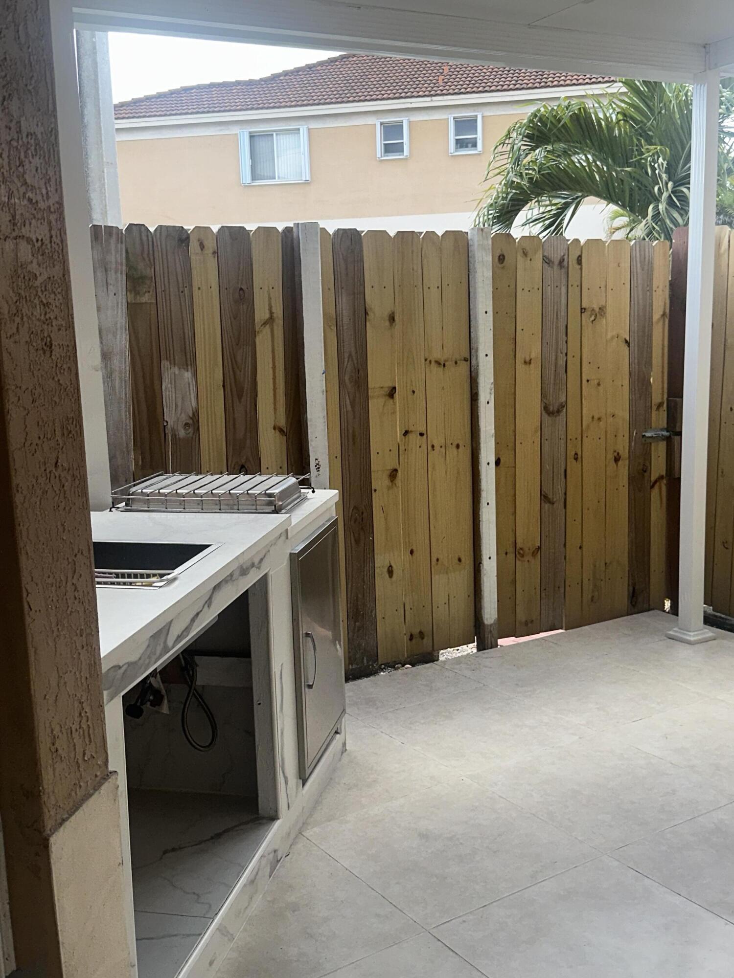 300 East 4th Street, Unit 103 Hialeah, FL 33010 - Photo 22 of 27 Patio