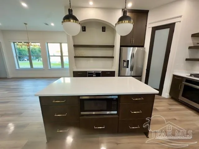 a view of a hallway view with staircase