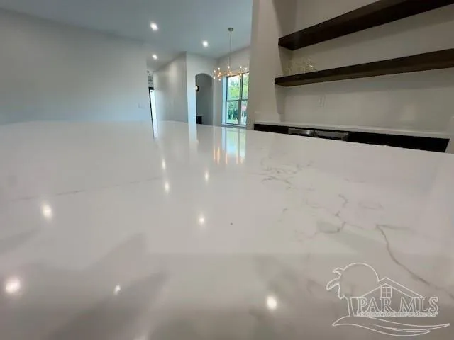 a bathroom with a toilet a sink and window