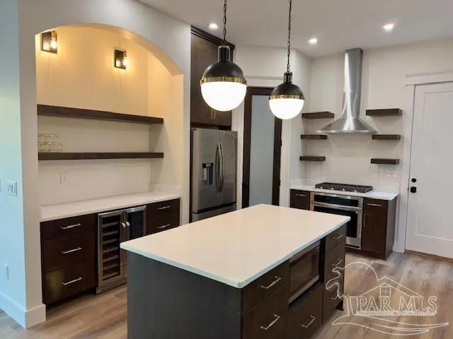 a kitchen with a table and chairs