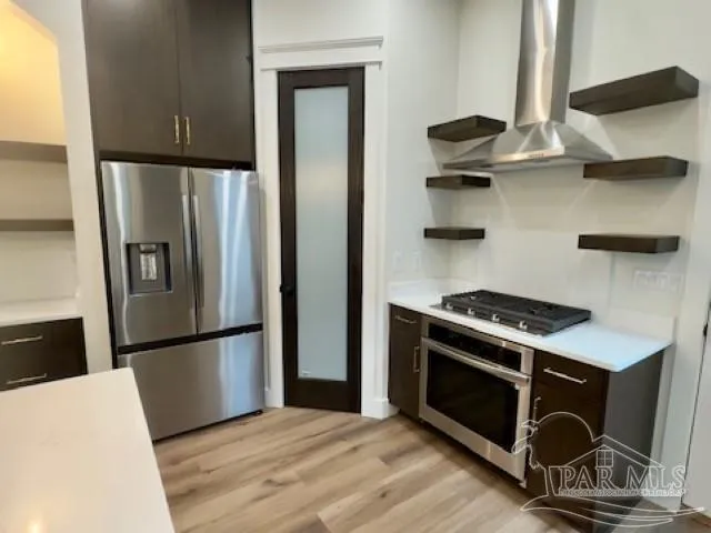 a kitchen with a sink and a refrigerator