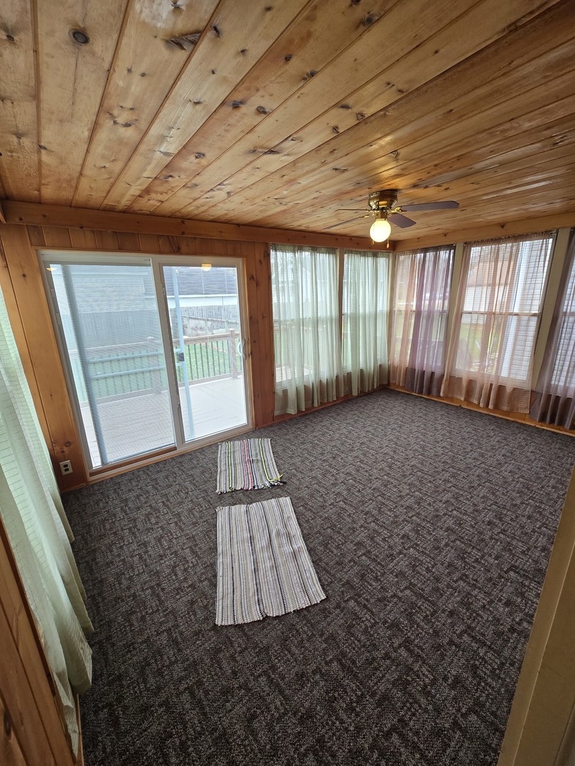 417 Stewart Avenue Woodstock, IL 60098 - Photo 16 of 22 a view of an empty room and window