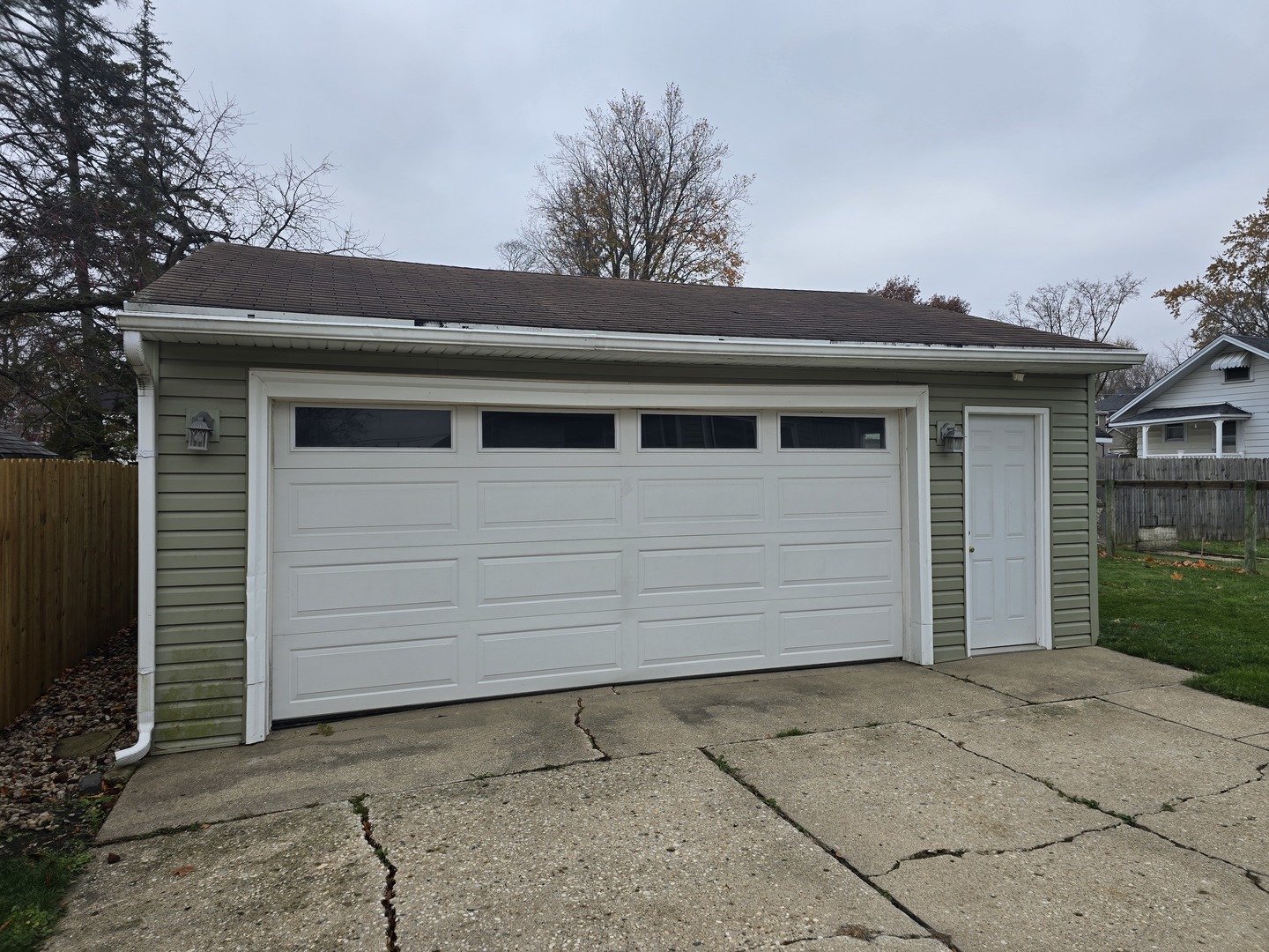 417 Stewart Avenue Woodstock, IL 60098 - Photo 4 of 22 a view of house with garage