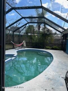 1450 Loring Street Cocoa, FL 32922 - Photo 14 of 16 a view of a swimming pool with a patio