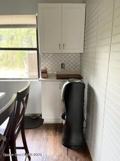1450 Loring Street Cocoa, FL 32922 - Photo 3 of 16 a view of a workspace with furniture and a window