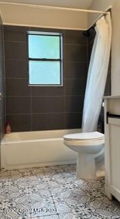 1450 Loring Street Cocoa, FL 32922 - Photo 7 of 16 a bathroom with a toilet and a bath tub