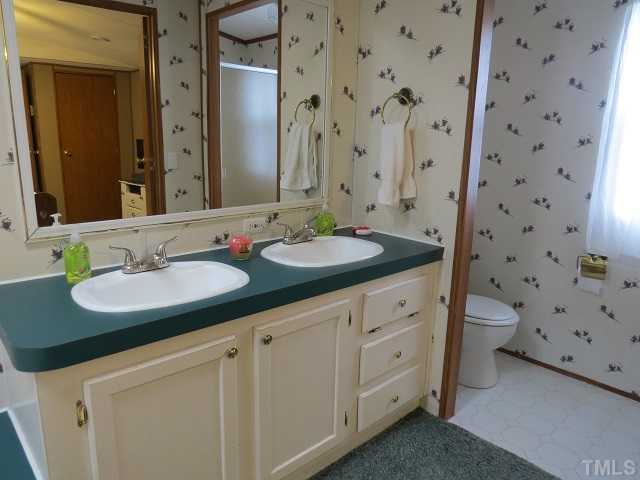 450 Substation Road Dunn, NC 28334 - Photo 15 of 25 Master bathroom