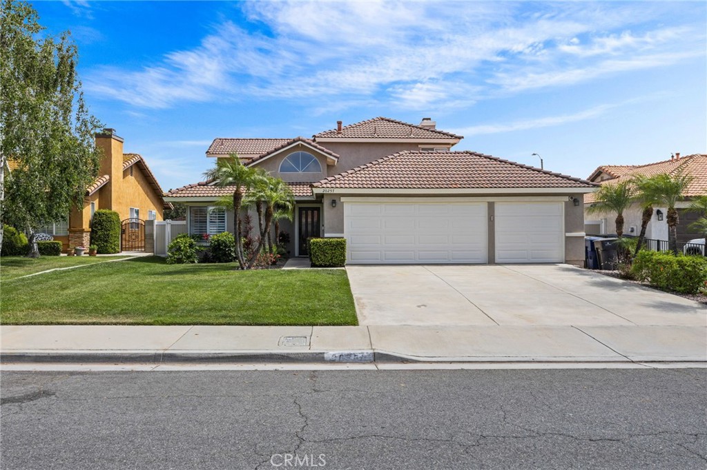 20257 Edmund Road Riverside, CA 92508 - Photo 44 of 53 front view of a house with a yard