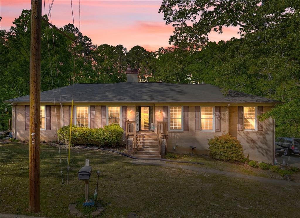 102 Hycliff Road Southwest Rome, GA 30165 - Photo 1 of 1 a view of a house with a yard