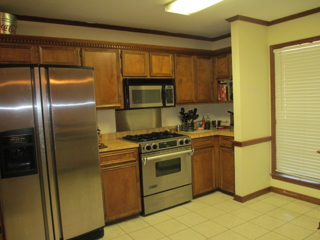 705 South Spring Lake Road Terry, MS 39170 - Photo 16 of 31 View of refrigerator - stove area