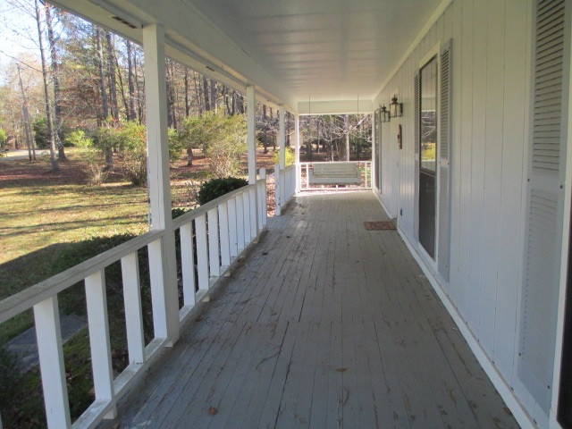 705 South Spring Lake Road Terry, MS 39170 - Photo 6 of 31 Long porch across front with swing