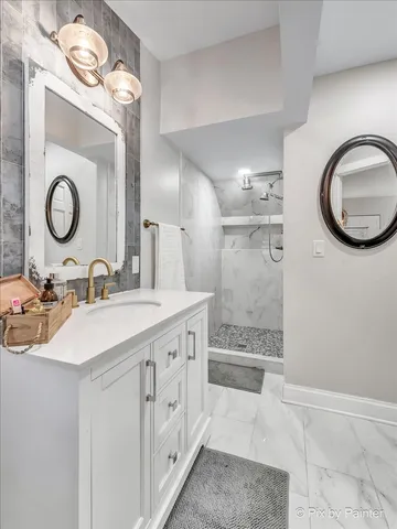 a spacious bedroom with a bed and a table in it