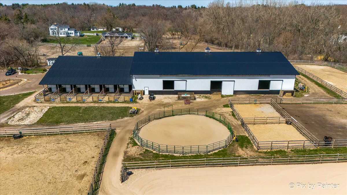 708 South Rose Farm Road Woodstock, IL 60098 - Photo 66 of 79 aerial view of a house with swimming pool and mountains