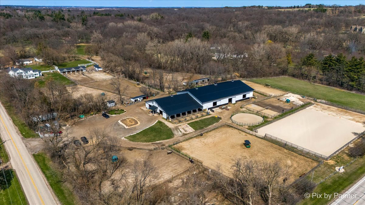 708 South Rose Farm Road Woodstock, IL 60098 - Photo 68 of 79 an aerial view of house with yard