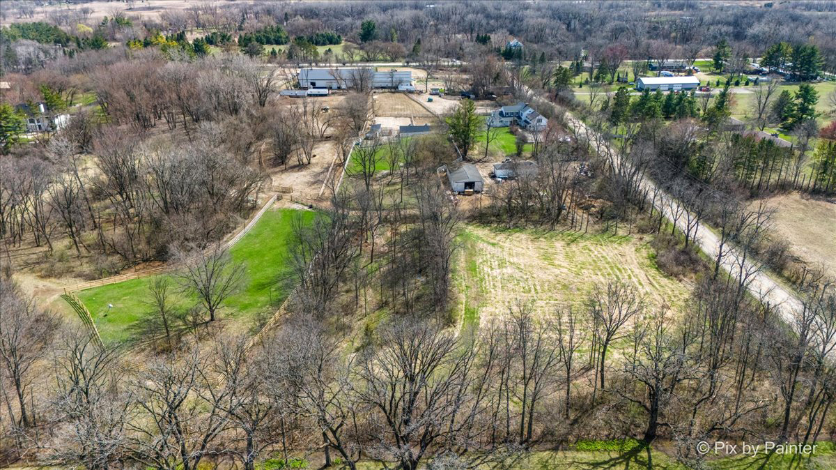 708 South Rose Farm Road Woodstock, IL 60098 - Photo 71 of 79 a aerial view of residential houses with outdoor space and trees