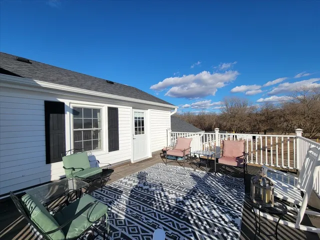a view of balcony with furniture