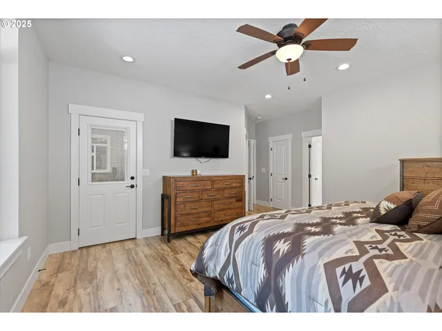 a bathroom with a sink double vanity granite and a mirror