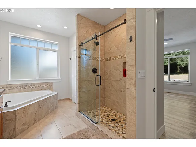 a bathroom with a bathtub and a sink