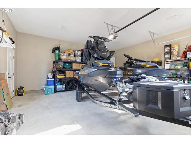 a view of living room with furniture and a flat screen tv