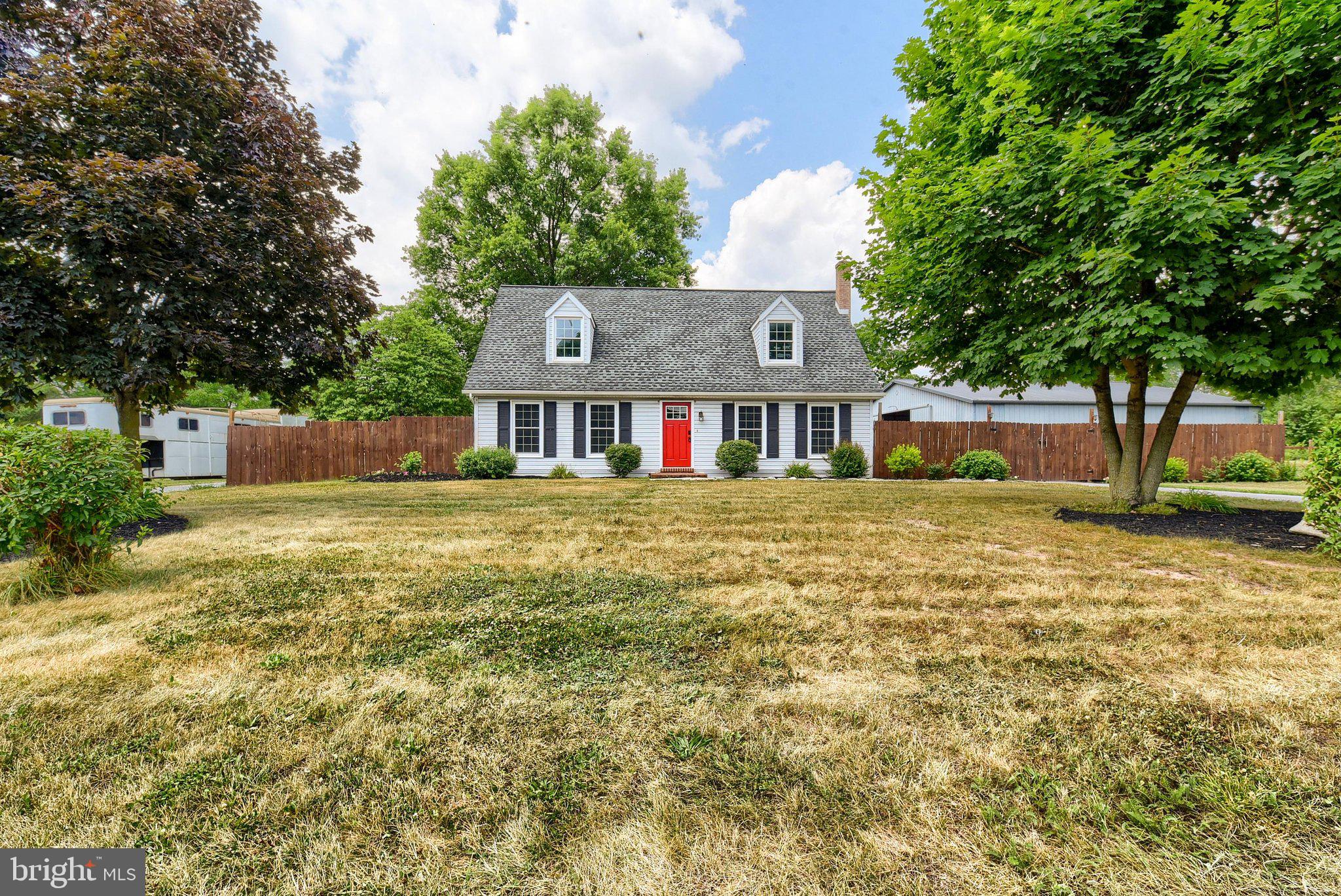 3740 Beagle Road Middletown, PA 17057 - Photo 2 of 70 a front view of a house with a yard