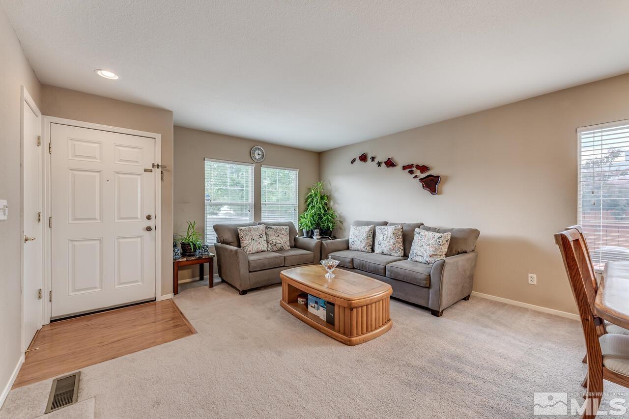7699 Corso Street Reno, NV 89506 - Photo 5 of 36 a living room with furniture and window