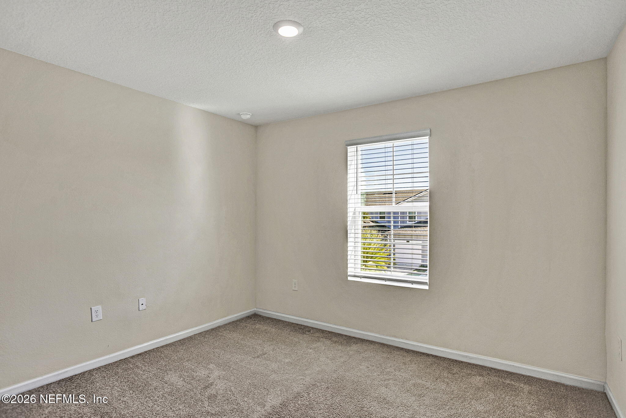 443 Coastline Way Street St. Augustine, FL 32092 - Photo 14 of 29 an empty room with a window