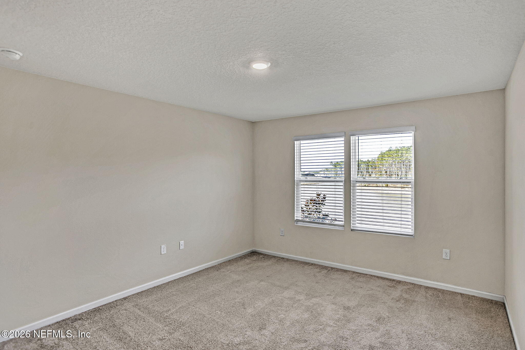 443 Coastline Way Street St. Augustine, FL 32092 - Photo 22 of 29 an empty room with a window