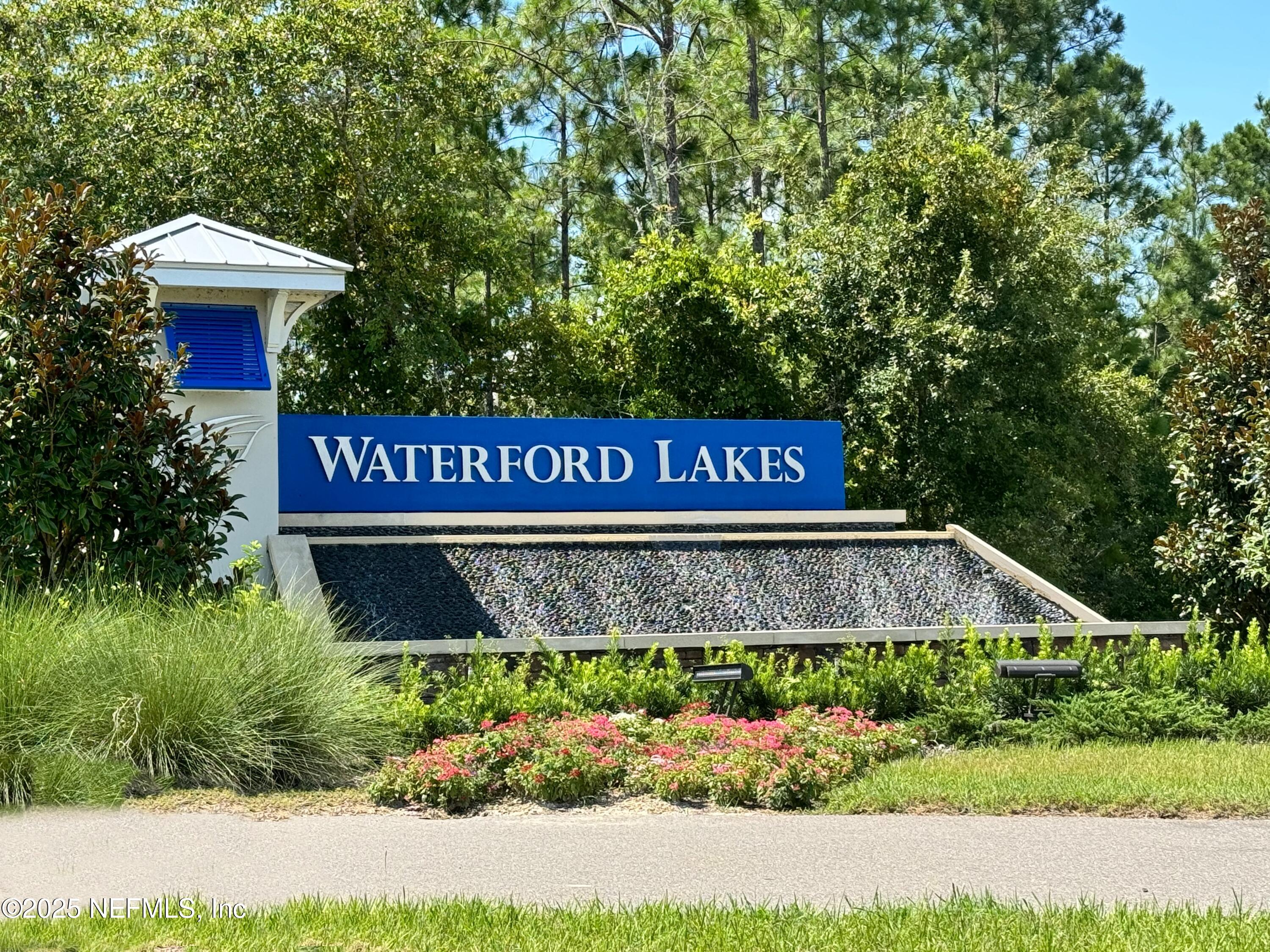 443 Coastline Way Street St. Augustine, FL 32092 - Photo 27 of 29 a view of outdoor space with signage and flags