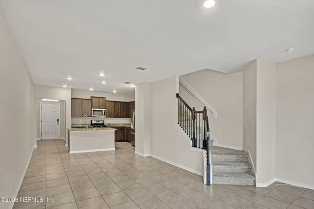 a view of hallway with stairs