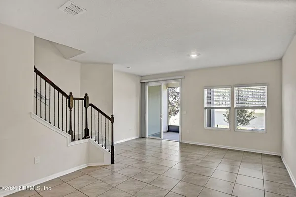 a view of an entryway with a livingroom