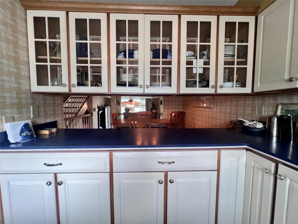 95116 Sandpiper Loop Fernandina Beach, FL 32034 - Photo 13 of 40 a kitchen with a sink and cabinets