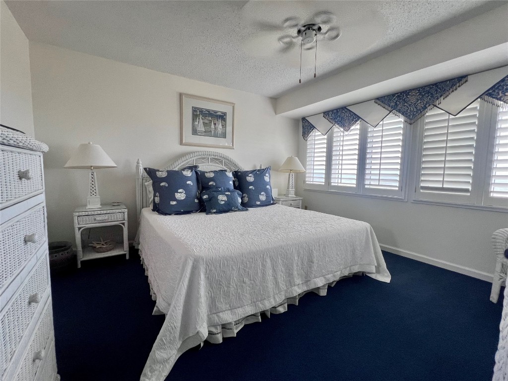 95116 Sandpiper Loop Fernandina Beach, FL 32034 - Photo 27 of 40 a bedroom with a bed and a window