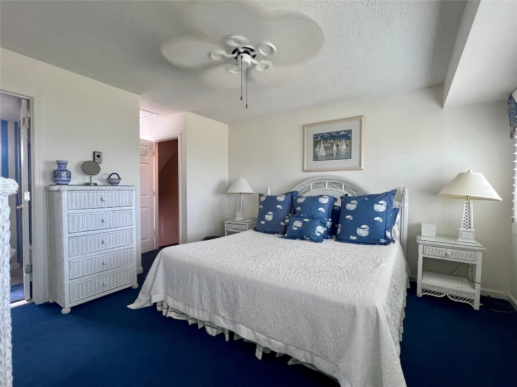 95116 Sandpiper Loop Fernandina Beach, FL 32034 - Photo 28 of 40 a bedroom with a bed and a closet
