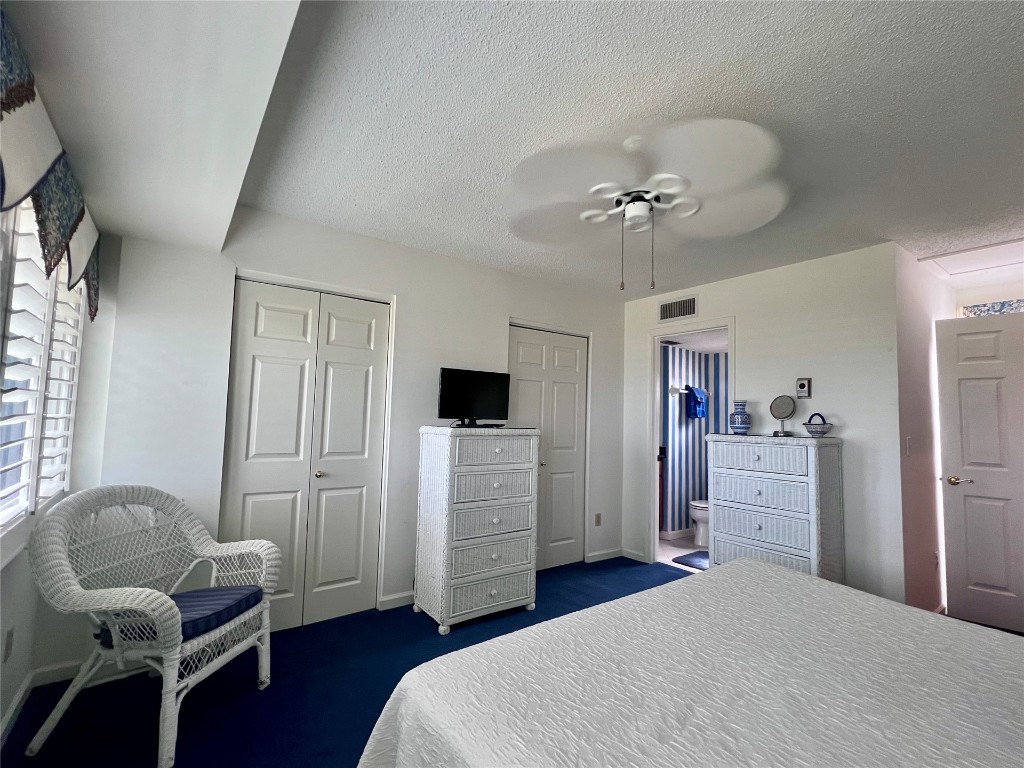 95116 Sandpiper Loop Fernandina Beach, FL 32034 - Photo 29 of 40 a bedroom with a bed and furniture