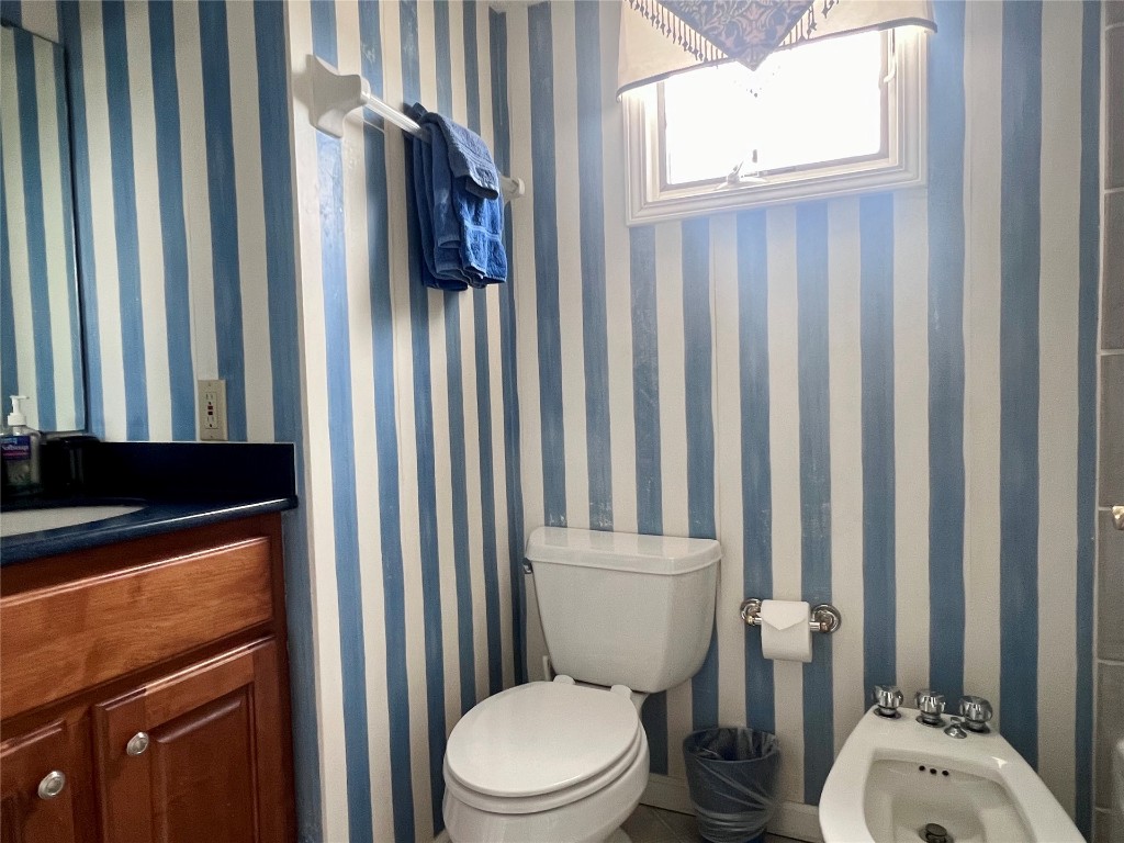 95116 Sandpiper Loop Fernandina Beach, FL 32034 - Photo 31 of 40 a white toilet sitting next to a window