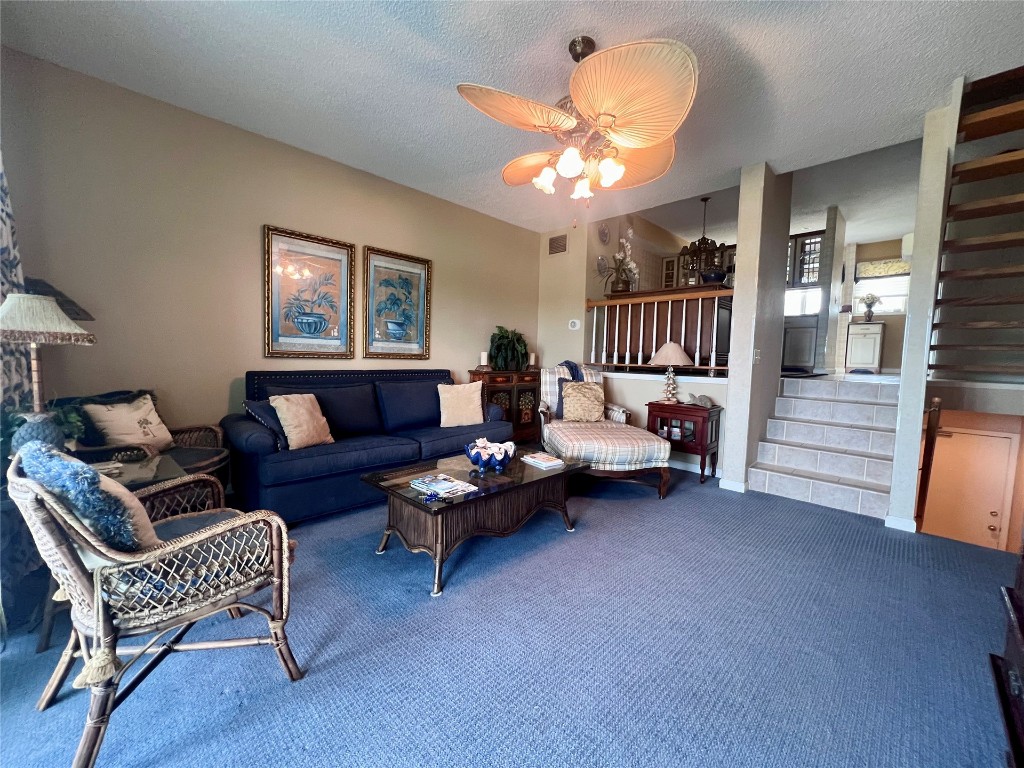 95116 Sandpiper Loop Fernandina Beach, FL 32034 - Photo 4 of 40 a living room with furniture and a chandelier