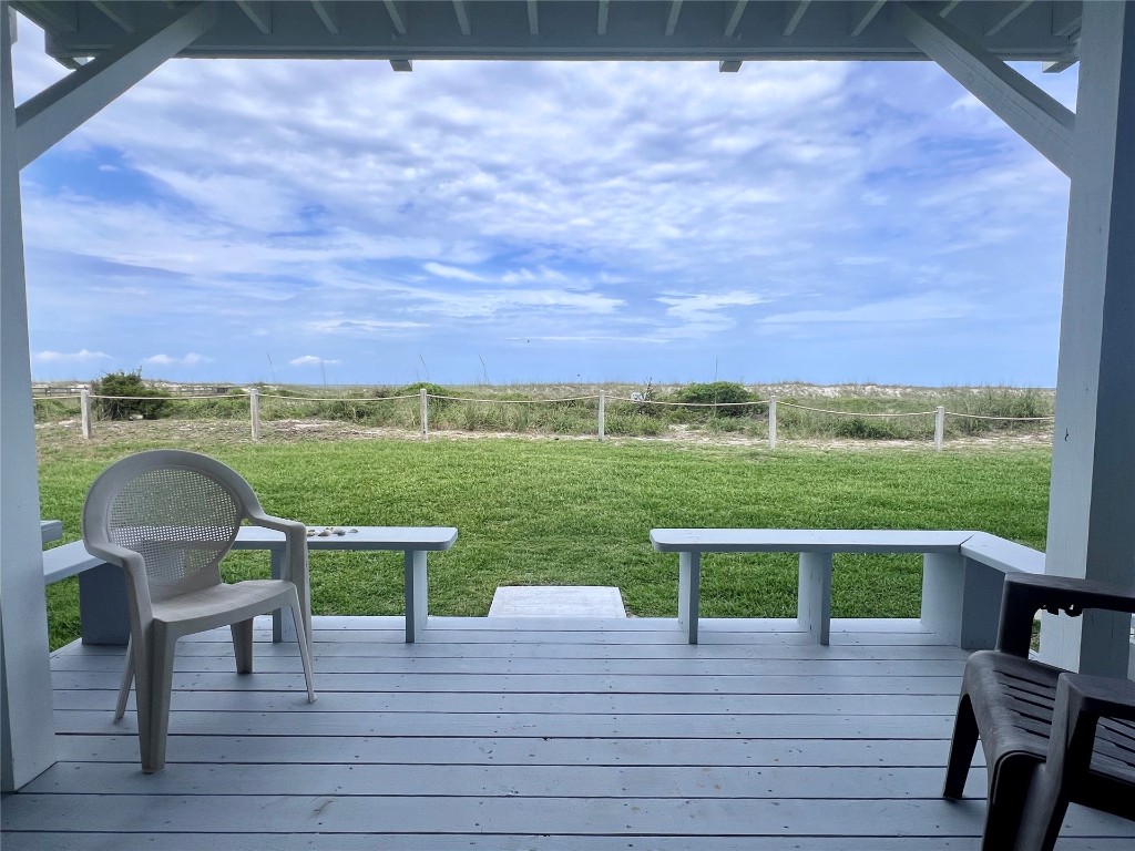95116 Sandpiper Loop Fernandina Beach, FL 32034 - Photo 7 of 40 a view of a lake with a table and chair