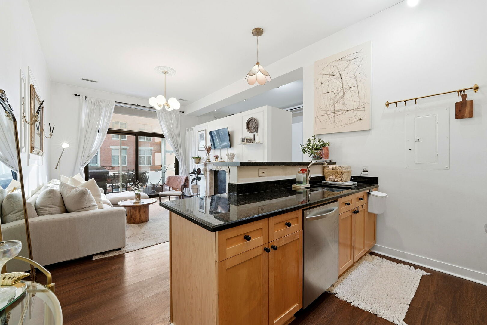 949 West Madison Street, Unit 304 Chicago, IL 60607 - Photo 8 of 21 a kitchen with stainless steel appliances granite countertop a sink and a stove