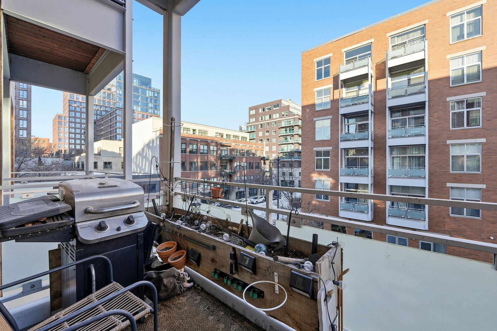 949 West Madison Street, Unit 304 Chicago, IL 60607 - Photo 9 of 21 a view of a city from a balcony