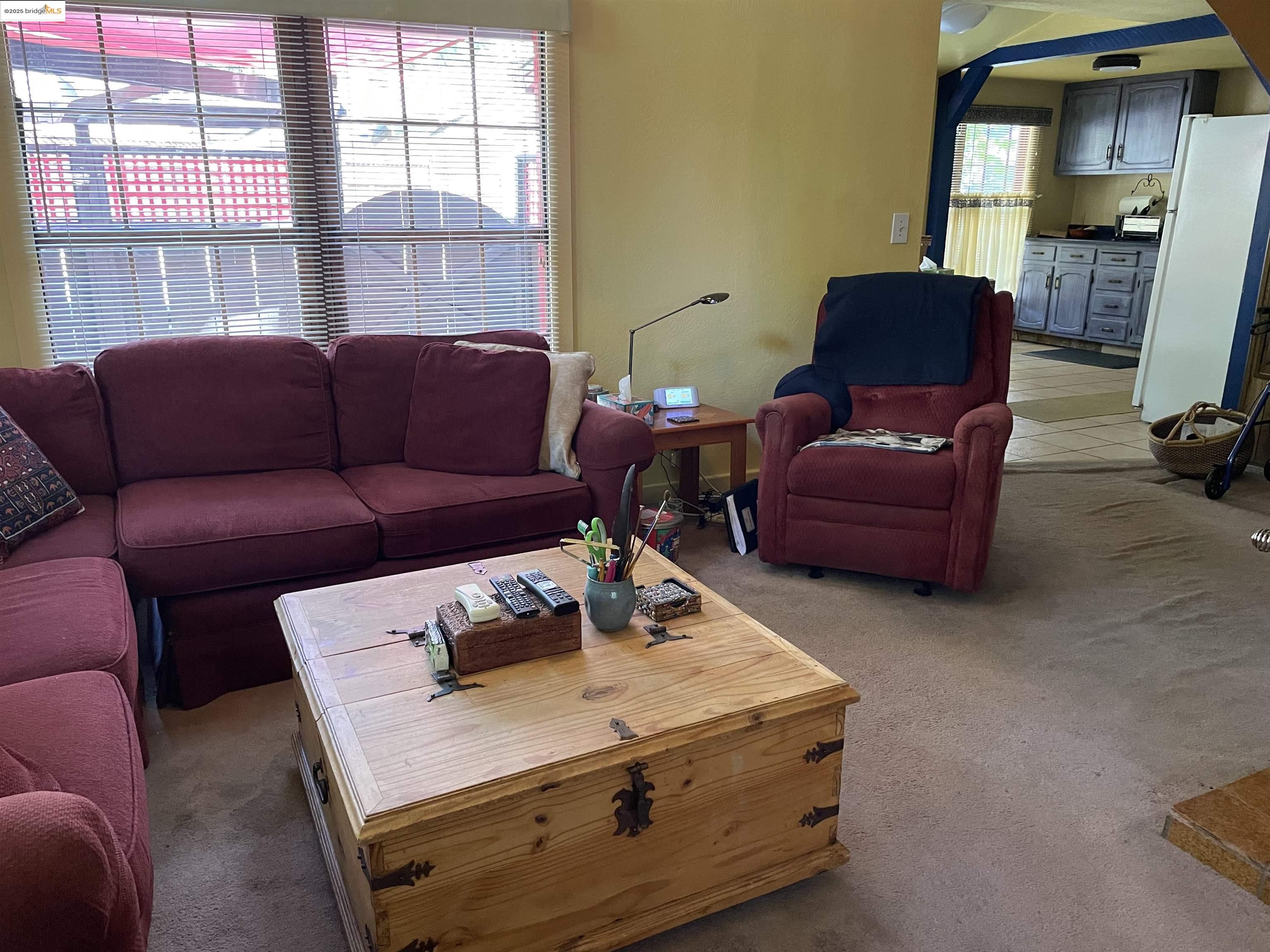 22846 Fuller Road Twain Harte, CA 95383 - Photo 5 of 40 Carpeted living room with arched walkways