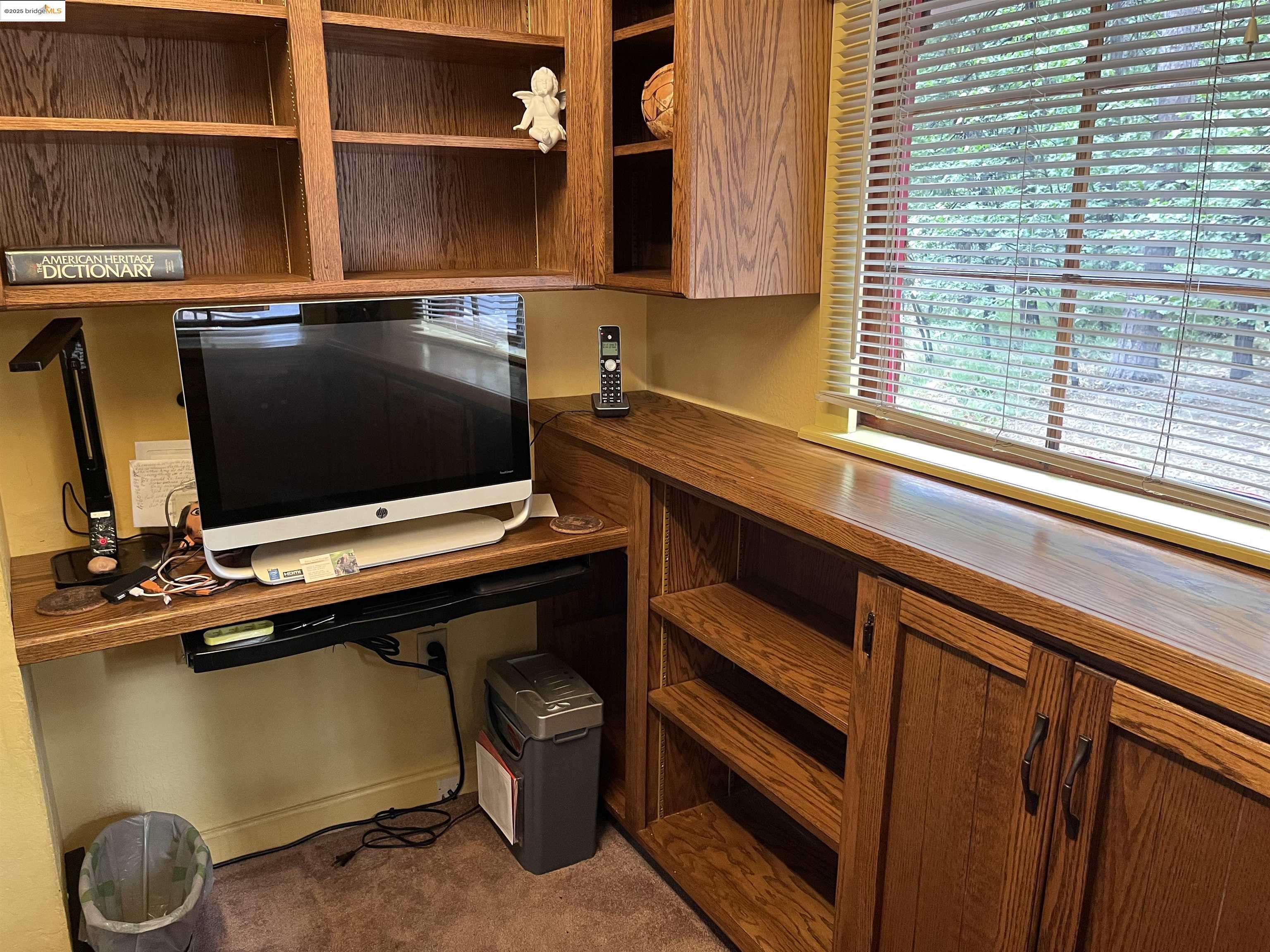 22846 Fuller Road Twain Harte, CA 95383 - Photo 9 of 40 Office with built in study area and dark colored carpet