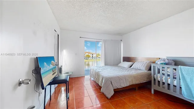 a view of a balcony with furniture