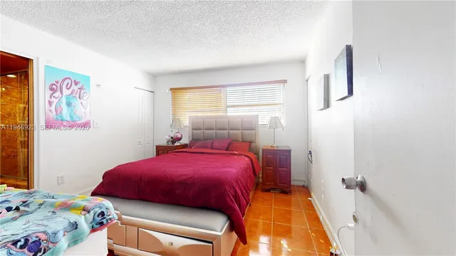 a view of a swimming pool with a yard