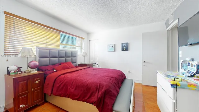 a view of a swimming pool with a lounge chairs