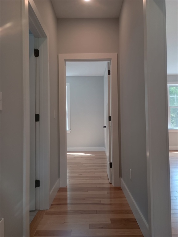 73 Depot Road Leverett, MA 01054 - Photo 20 of 39 a view of a hallway with wooden floor