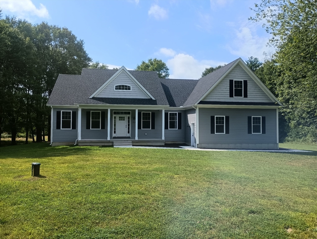 73 Depot Road Leverett, MA 01054 - Photo 2 of 39 a front view of a house with a garden